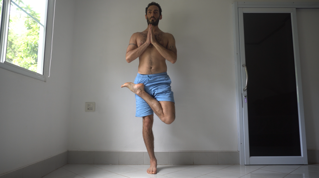 Standing half padmasana